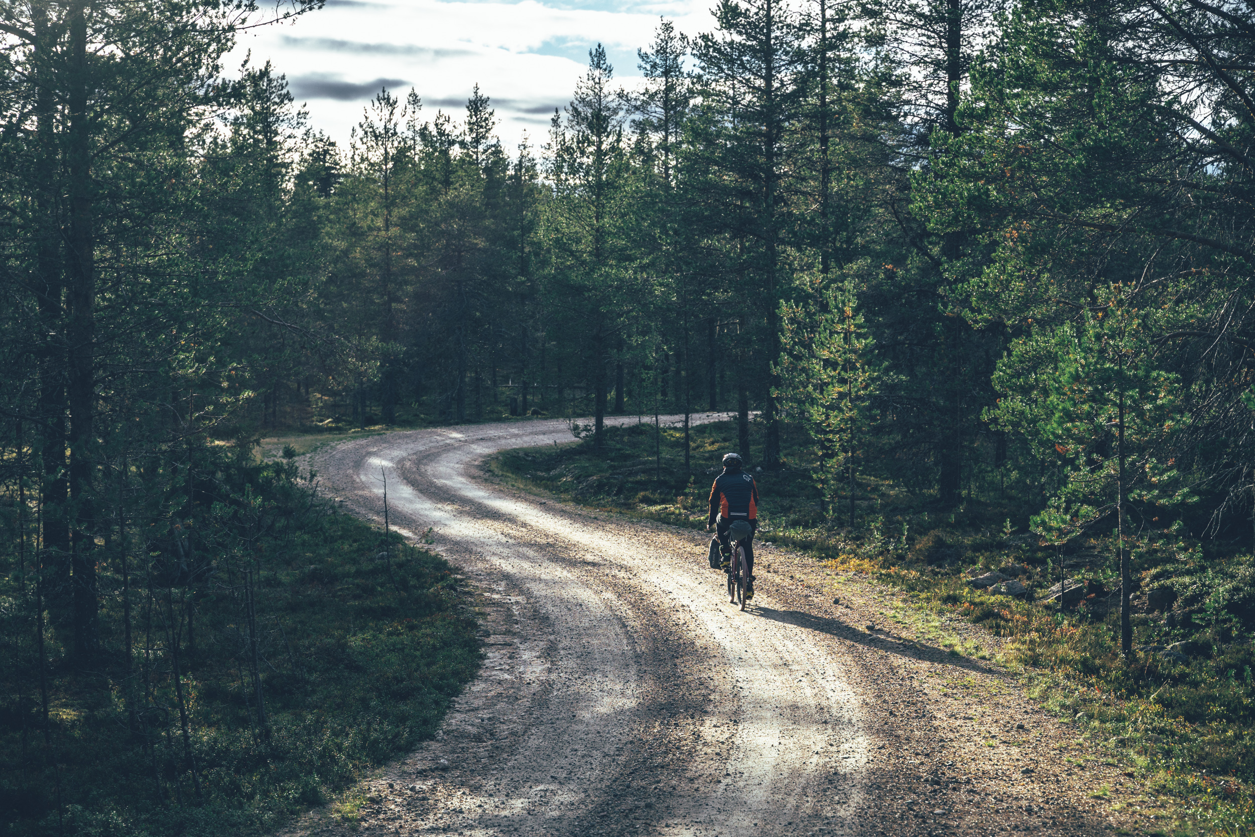 Biker on a gravel road